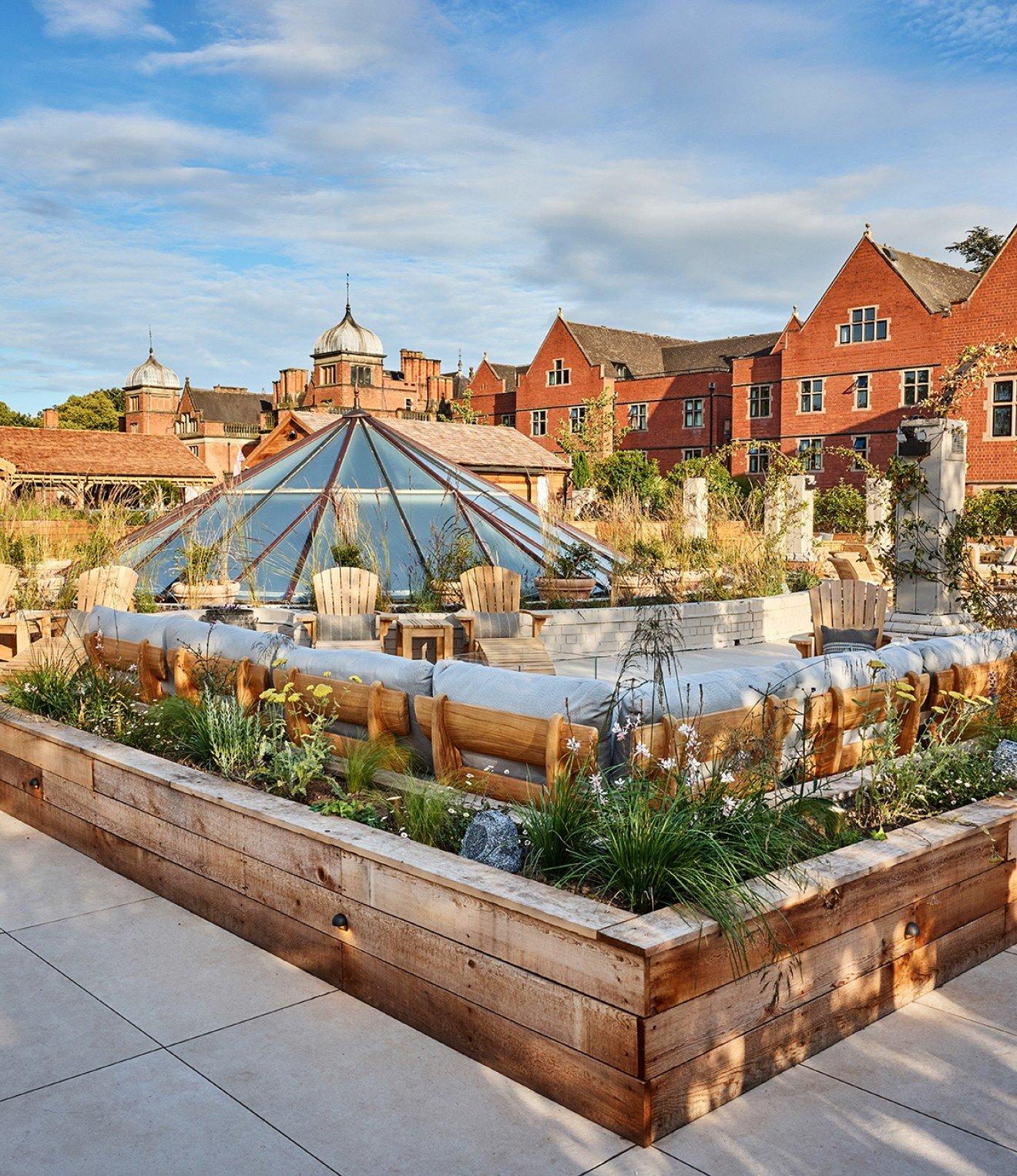 a garden with a large glass dome in the middle of it